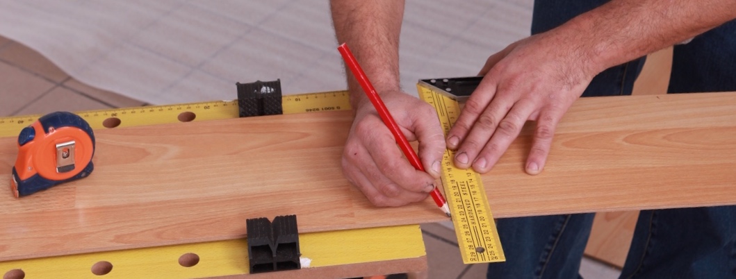 carpenter taking measurements.jpg